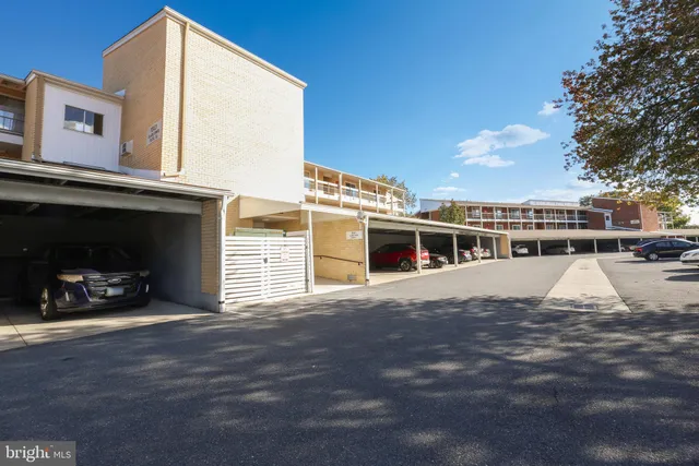 a view of a building with a yard