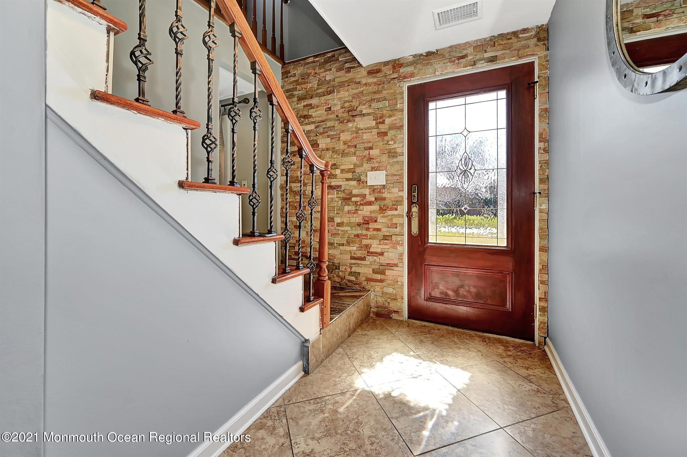115 Old Queens Boulevard Manalapan, NJ 07726 - Photo 2 of 28 02-Front Entry
