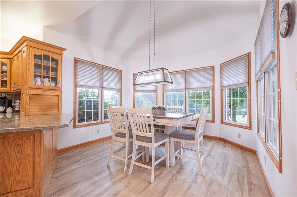 840 Old Millcreek Road Hookstown, PA 15050 - Photo 14 of 33 a view of a dining room with furniture large windows and wooden floor