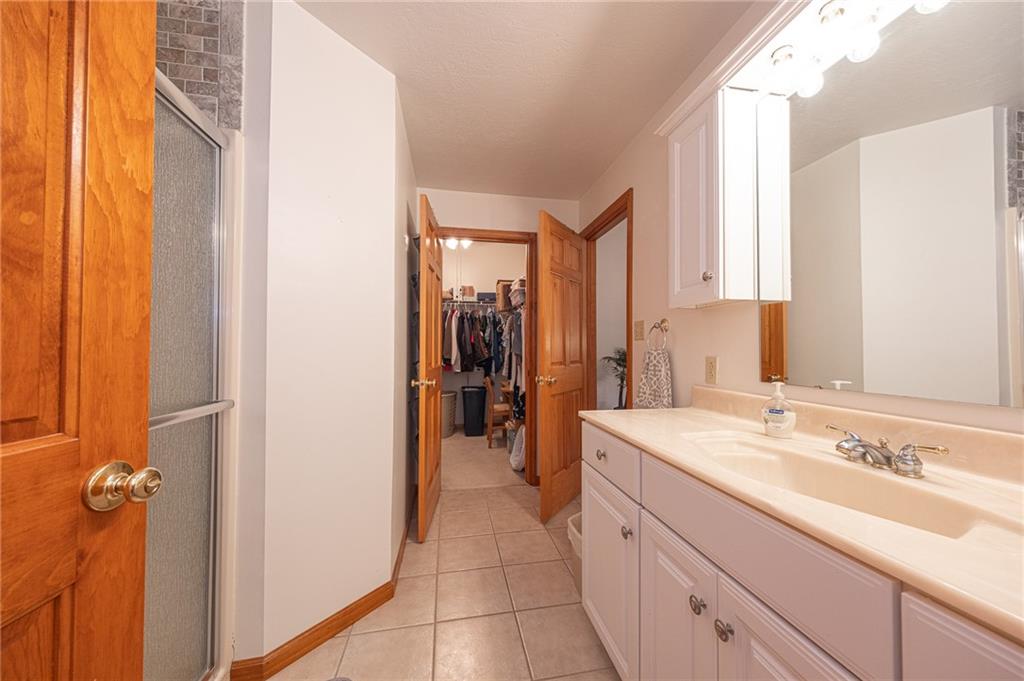 840 Old Millcreek Road Hookstown, PA 15050 - Photo 19 of 33 a spacious bathroom with a sink and a mirror