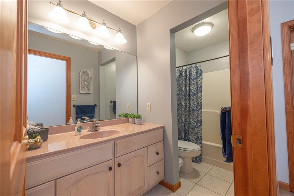 840 Old Millcreek Road Hookstown, PA 15050 - Photo 20 of 33 a bathroom with a double vanity sink toilet and shower