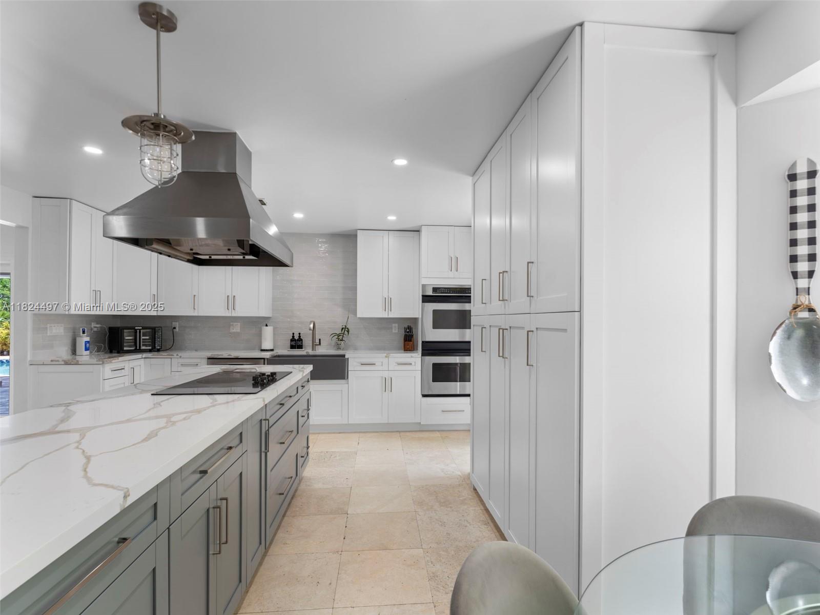 1851 Southwest 126th Court Miami, FL 33175 - Photo 15 of 85 a large kitchen with stainless steel appliances kitchen island granite countertop a sink and cabinets