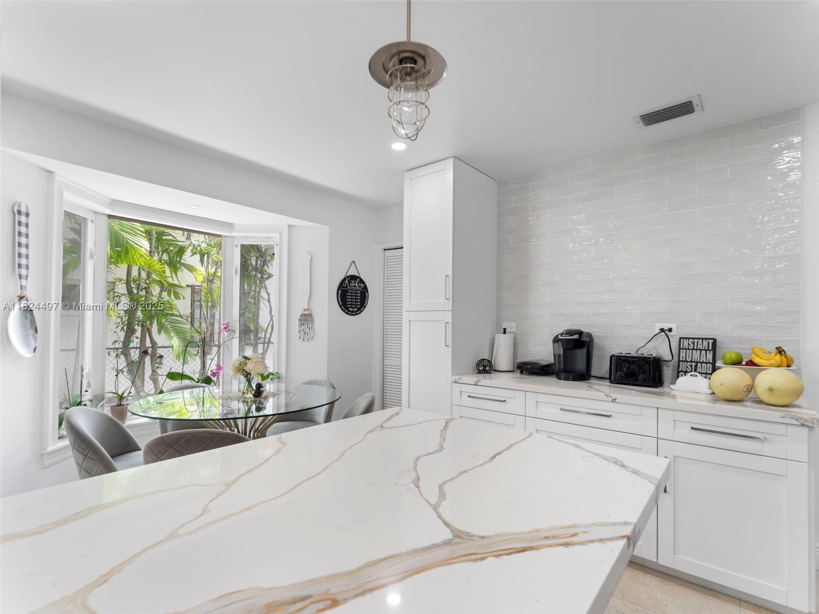 1851 Southwest 126th Court Miami, FL 33175 - Photo 18 of 85 a bathroom with a granite countertop sink mirror and window