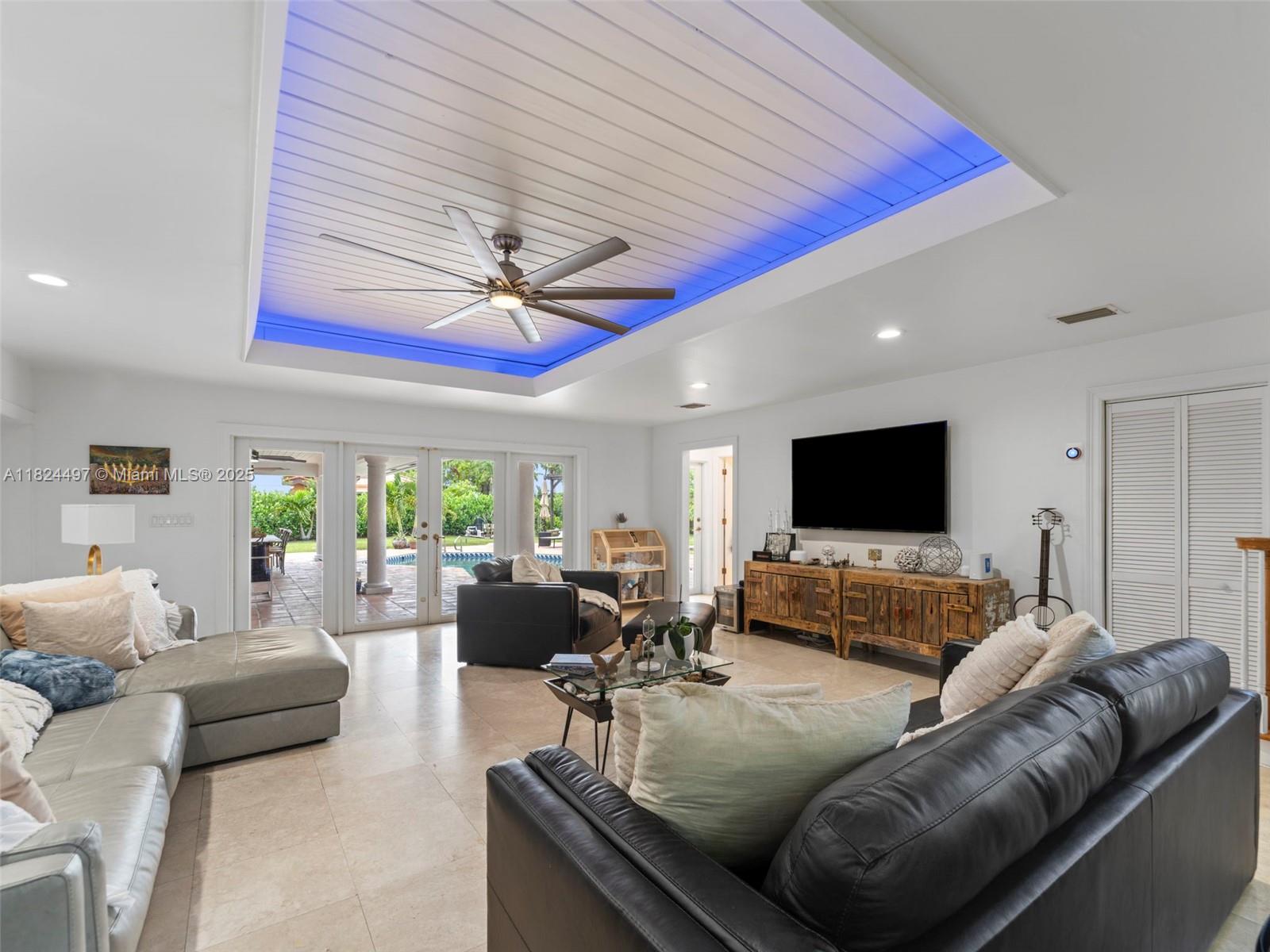 1851 Southwest 126th Court Miami, FL 33175 - Photo 28 of 85 a living room with furniture and a flat screen tv