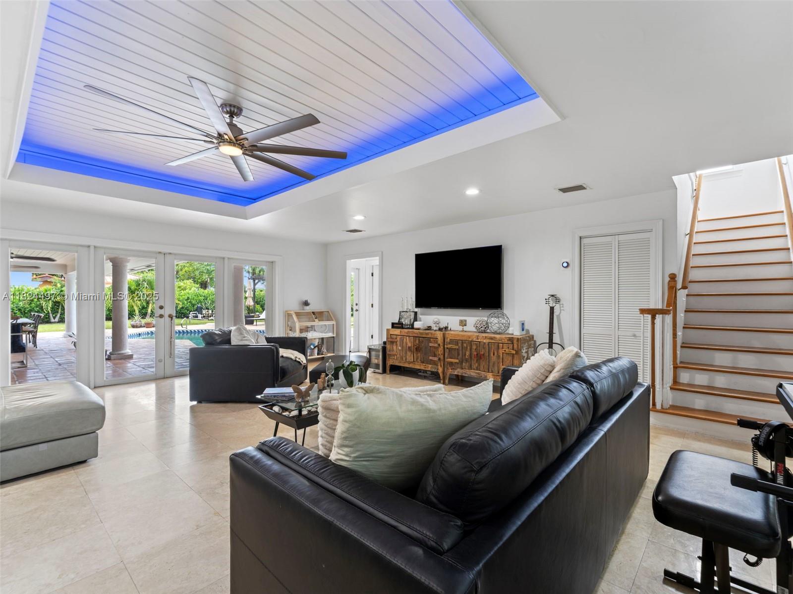 1851 Southwest 126th Court Miami, FL 33175 - Photo 29 of 85 a living room with furniture and a flat screen tv