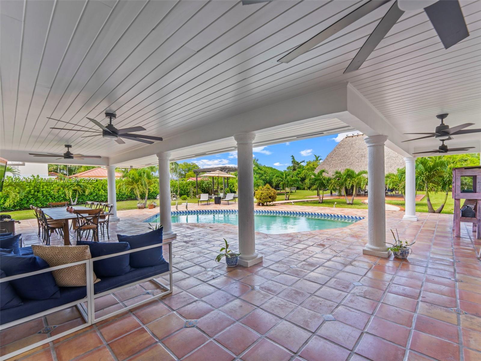1851 Southwest 126th Court Miami, FL 33175 - Photo 31 of 85 a view of swimming pool with outdoor seating