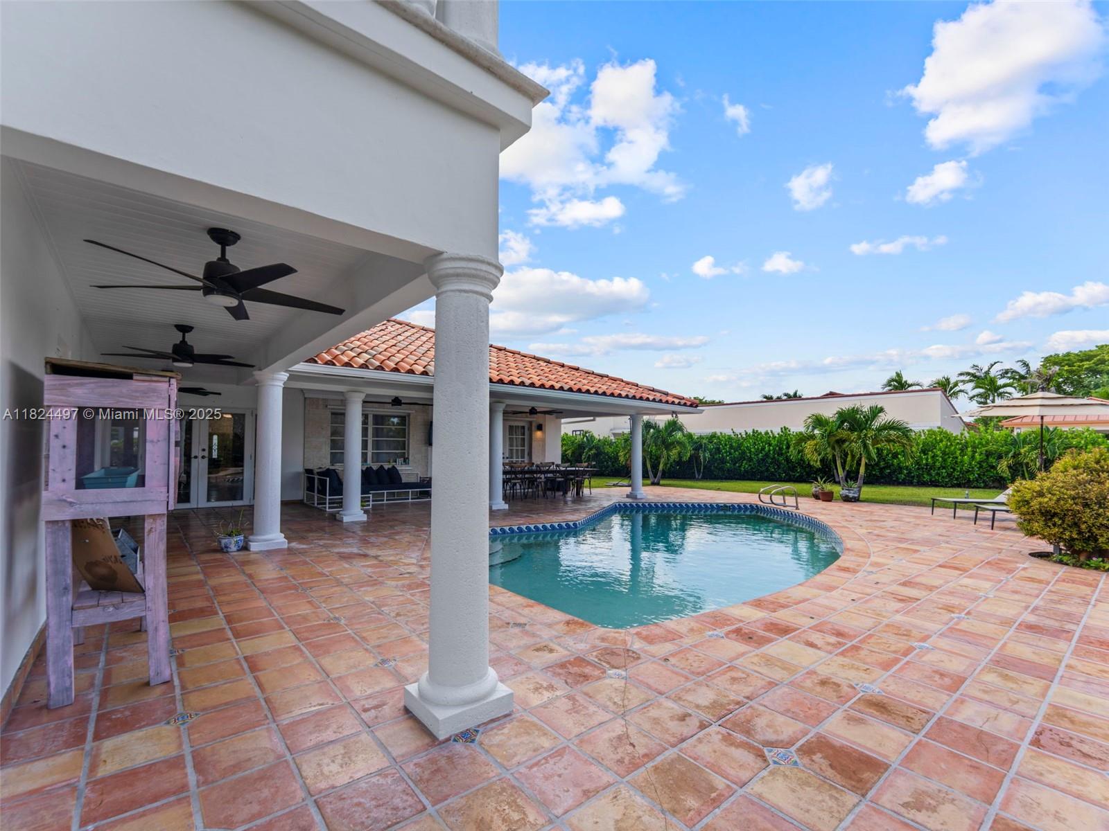 1851 Southwest 126th Court Miami, FL 33175 - Photo 34 of 85 a view of a swimming pool with a patio