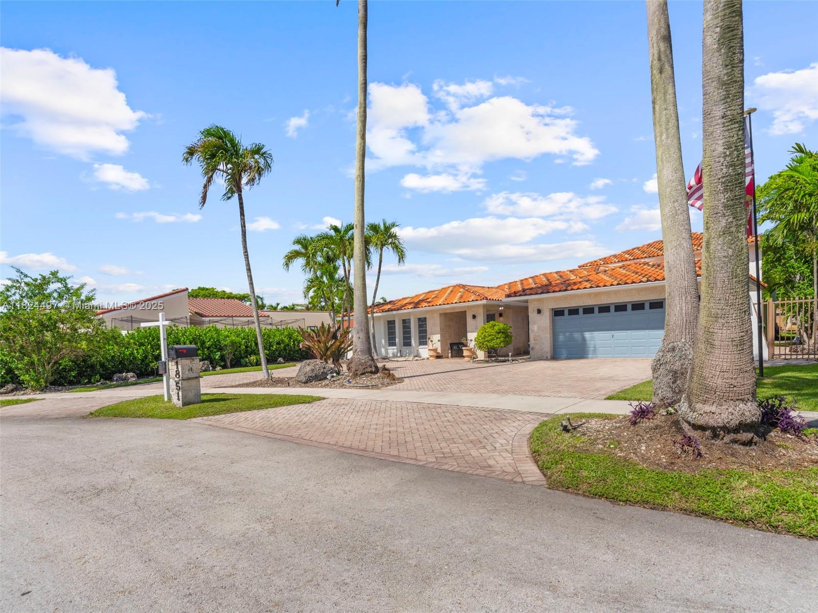 1851 Southwest 126th Court Miami, FL 33175 - Photo 5 of 85 a front view of a house with a garden and trees