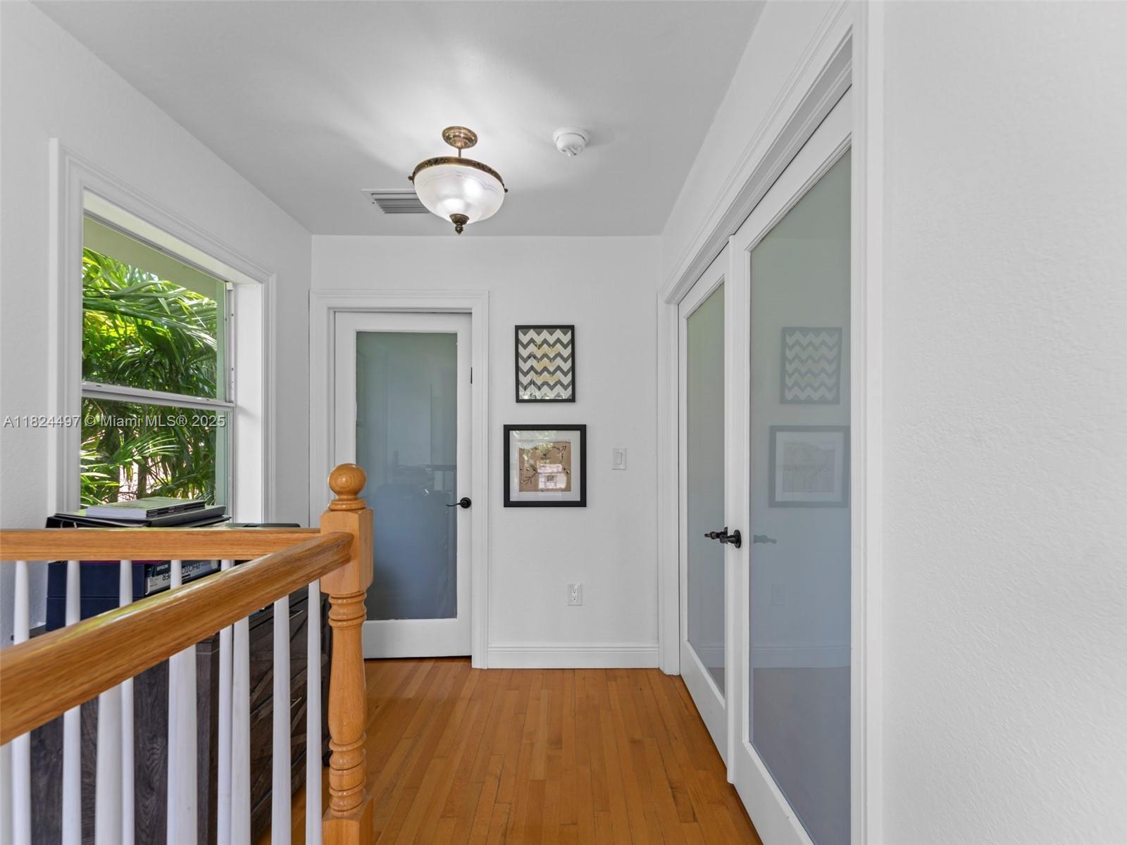 1851 Southwest 126th Court Miami, FL 33175 - Photo 61 of 85 a view of a hallway with a window