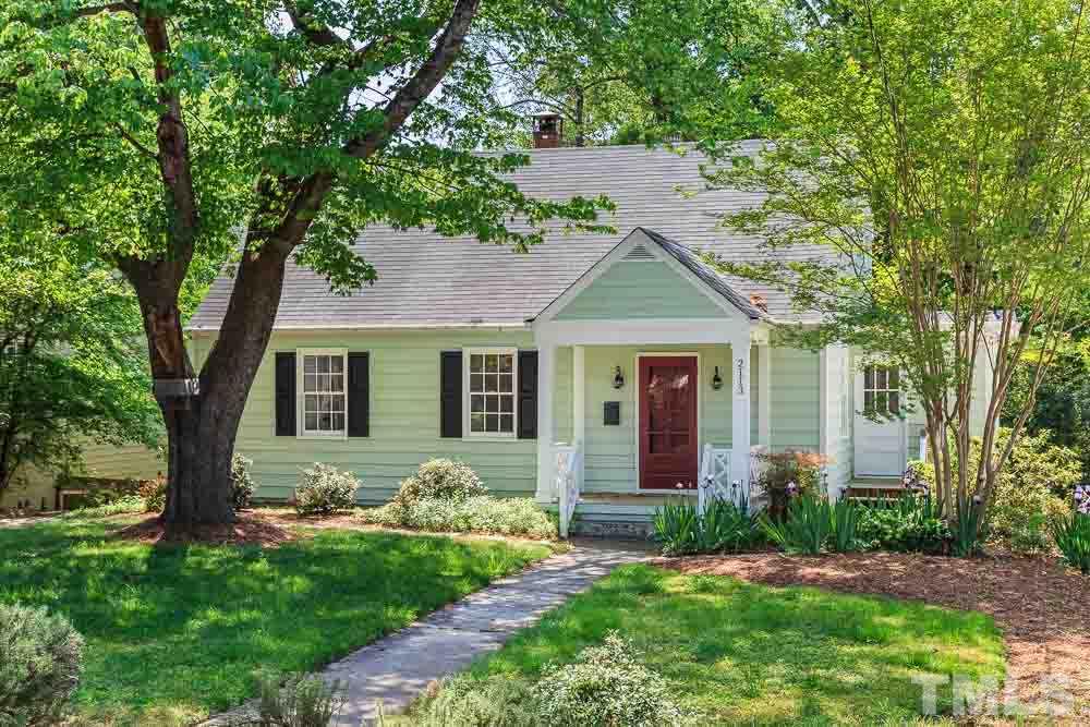 2113 Pine Drive Raleigh, NC 27608 - Photo 1 of 25 a front view of a house with a garden