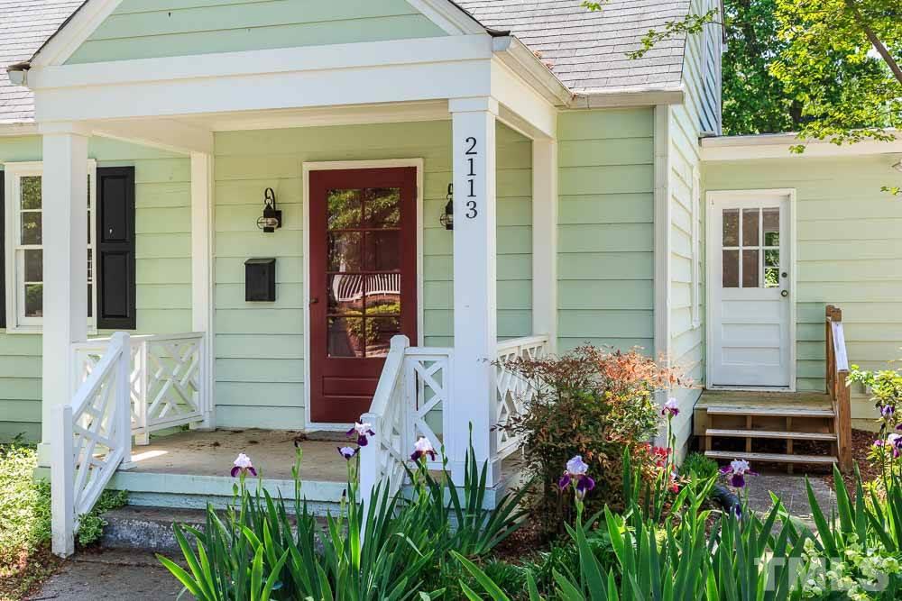 2113 Pine Drive Raleigh, NC 27608 - Photo 2 of 25 a front view of a house with a yard