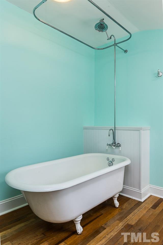 2113 Pine Drive Raleigh, NC 27608 - Photo 14 of 25 a bathroom with a bathtub and shower