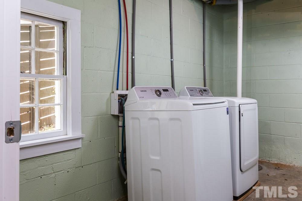 2113 Pine Drive Raleigh, NC 27608 - Photo 22 of 25 a utility room with dryer and washer