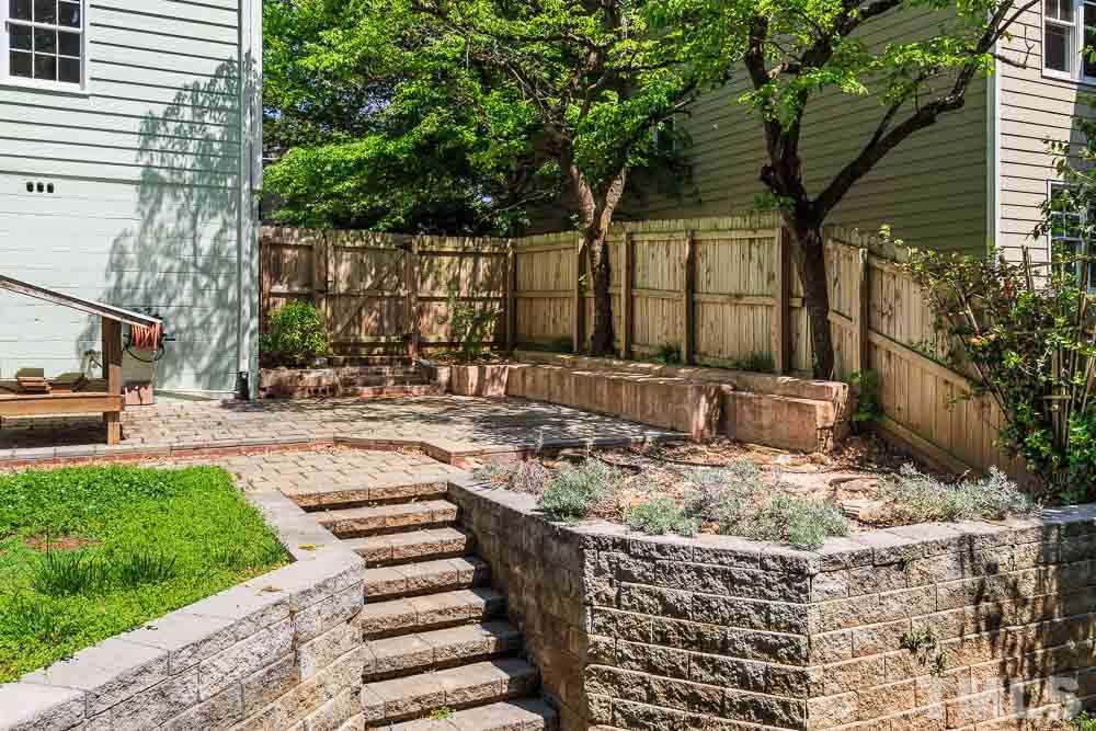 2113 Pine Drive Raleigh, NC 27608 - Photo 24 of 25 a view of a backyard with sitting area