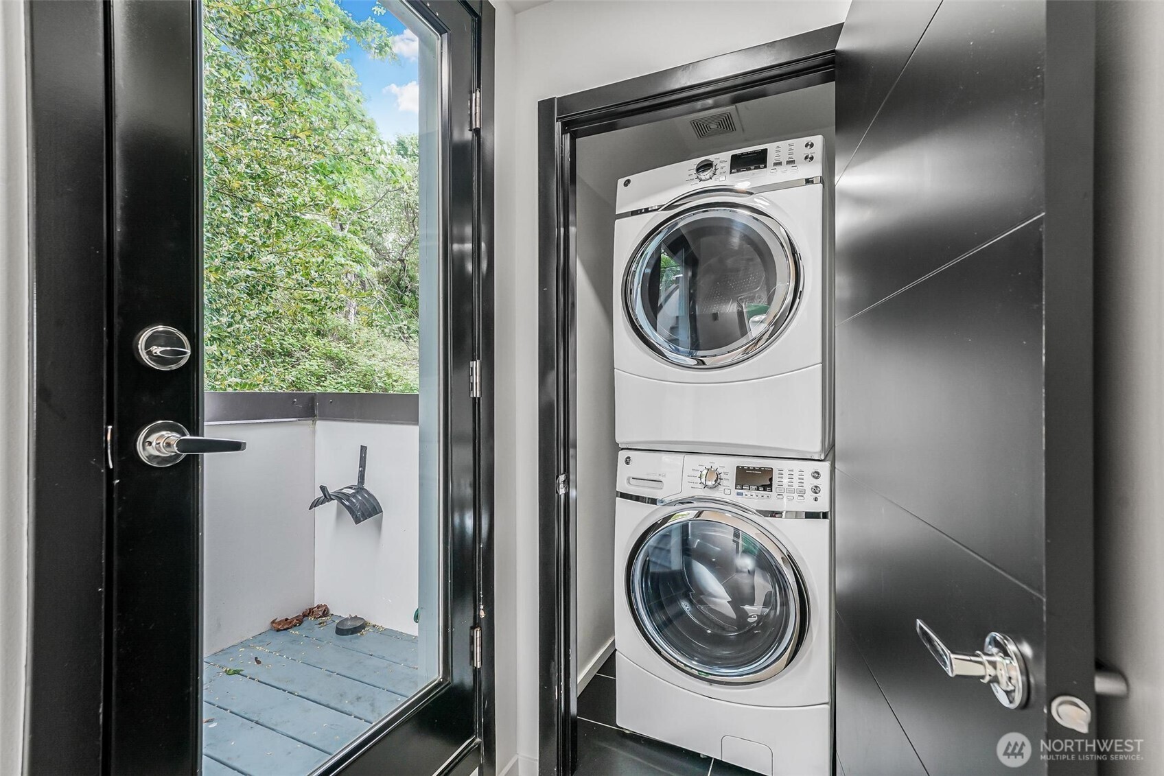7748 Delridge Way Southwest Seattle, WA 98106 - Photo 16 of 22 a utility room with dryer and washer