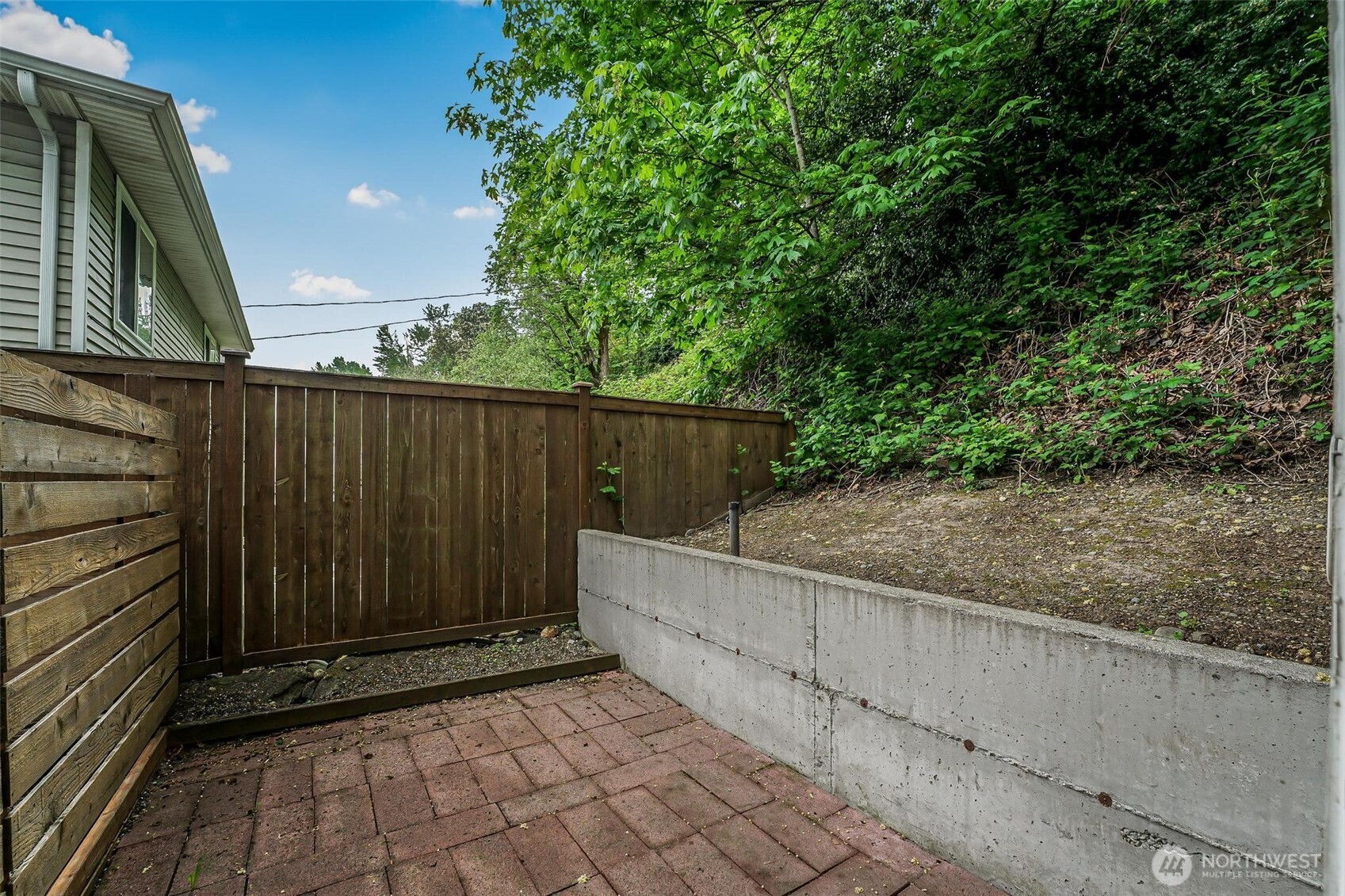 7748 Delridge Way Southwest Seattle, WA 98106 - Photo 17 of 22 a view of a wooden fence