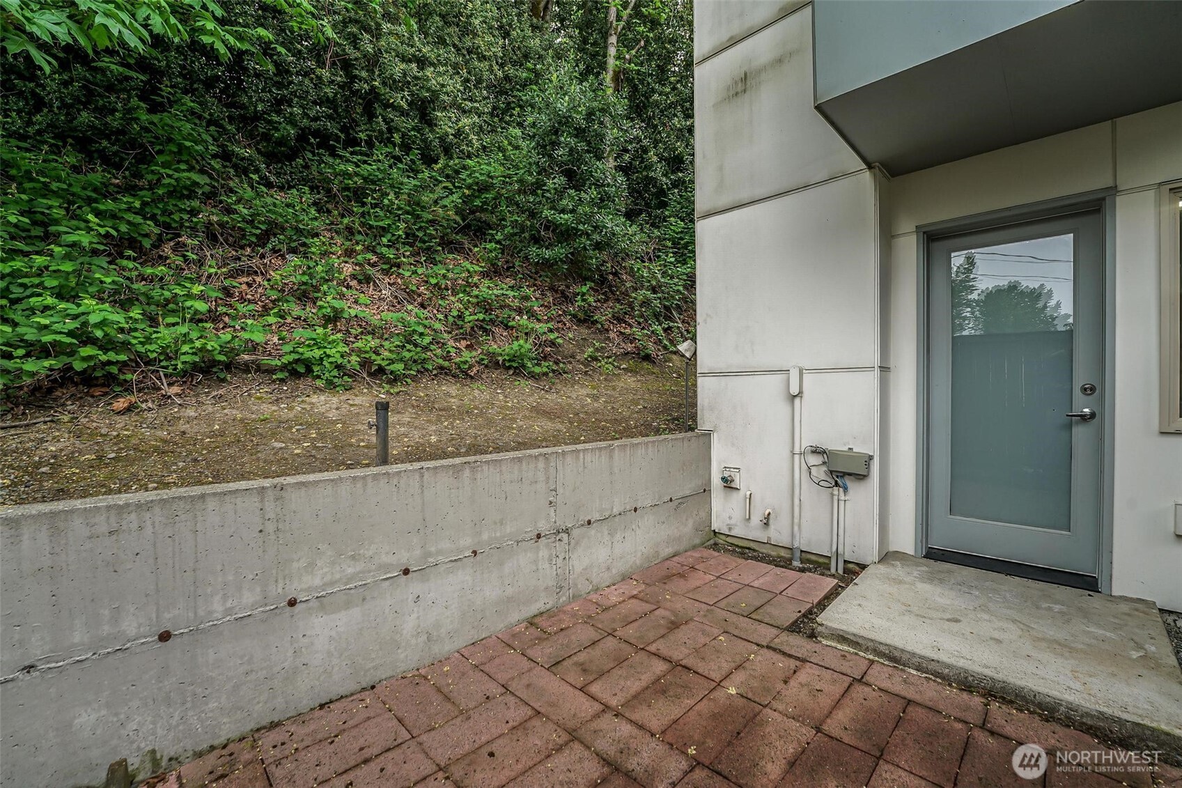 7748 Delridge Way Southwest Seattle, WA 98106 - Photo 19 of 22 a view of a backyard of the house