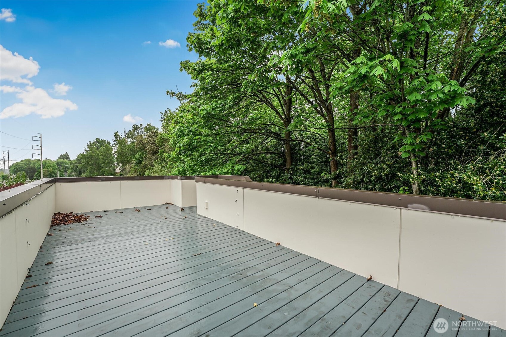 7748 Delridge Way Southwest Seattle, WA 98106 - Photo 22 of 22 a view of balcony with wooden floor and fence