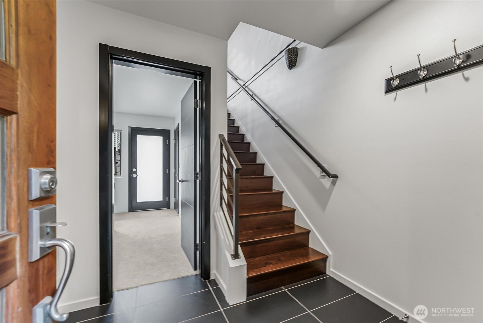 7748 Delridge Way Southwest Seattle, WA 98106 - Photo 3 of 22 a view of a hallway with entryway and closet