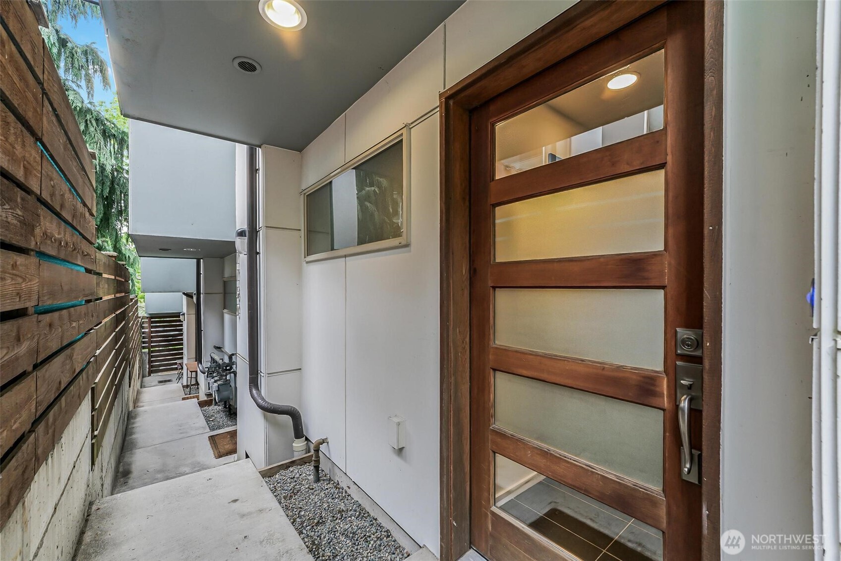 7748 Delridge Way Southwest Seattle, WA 98106 - Photo 5 of 22 a view of hallway with stairs