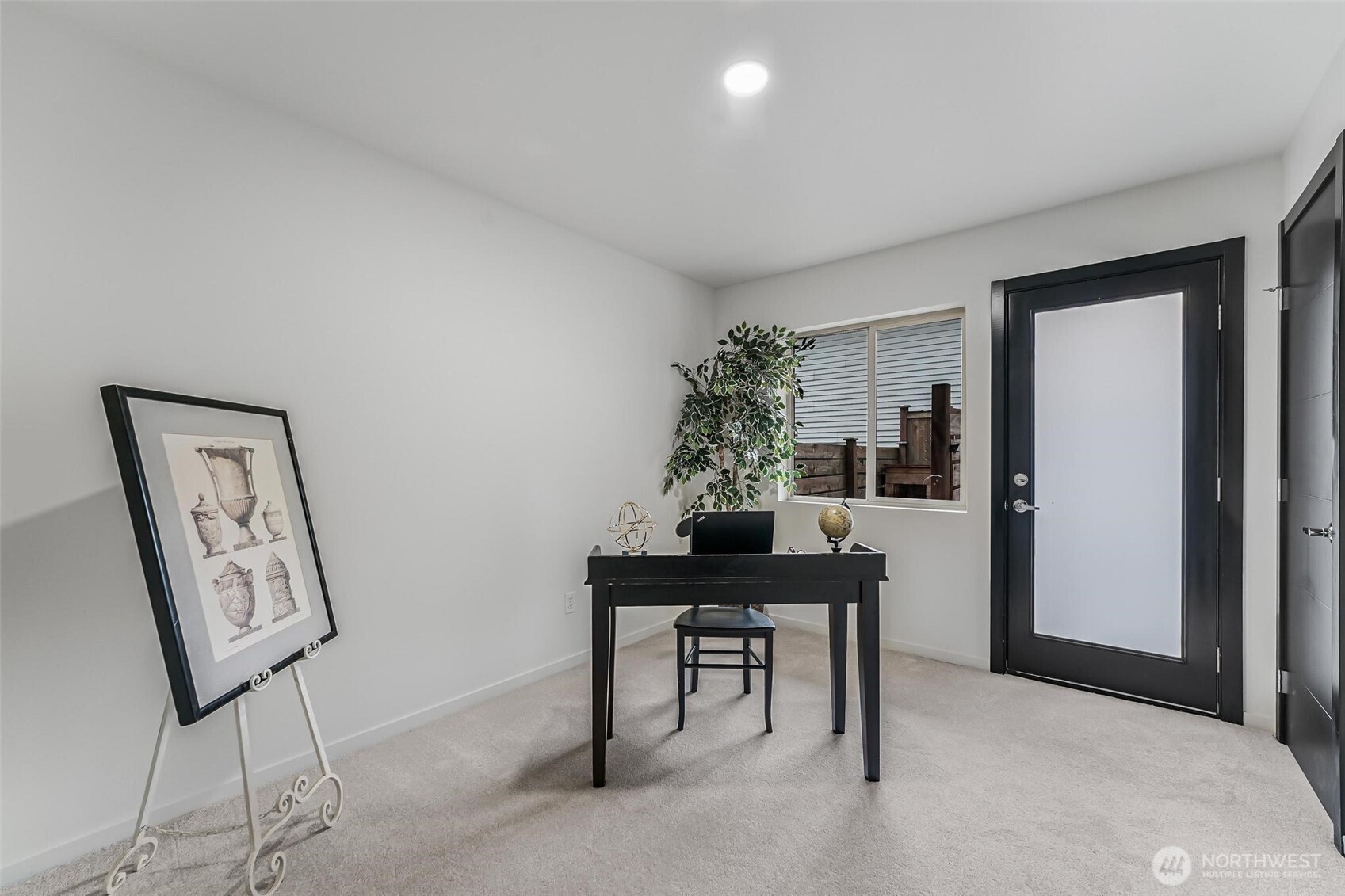 7748 Delridge Way Southwest Seattle, WA 98106 - Photo 7 of 22 a view of a workspace with furniture