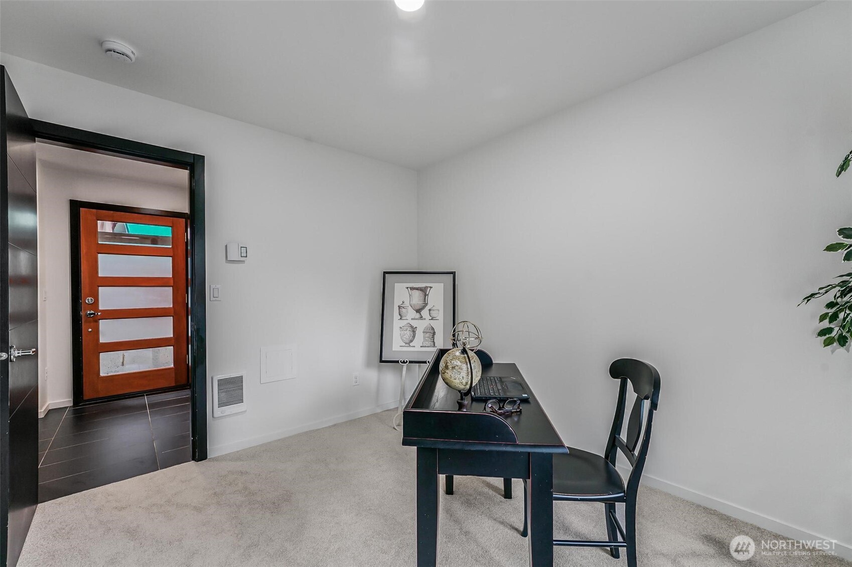 7748 Delridge Way Southwest Seattle, WA 98106 - Photo 8 of 22 a view of a workspace with furniture and window