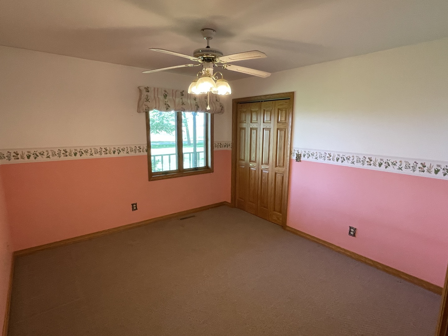 1685 West Mine Road Mazon, IL 60444 - Photo 44 of 48 an empty room with windows and fan