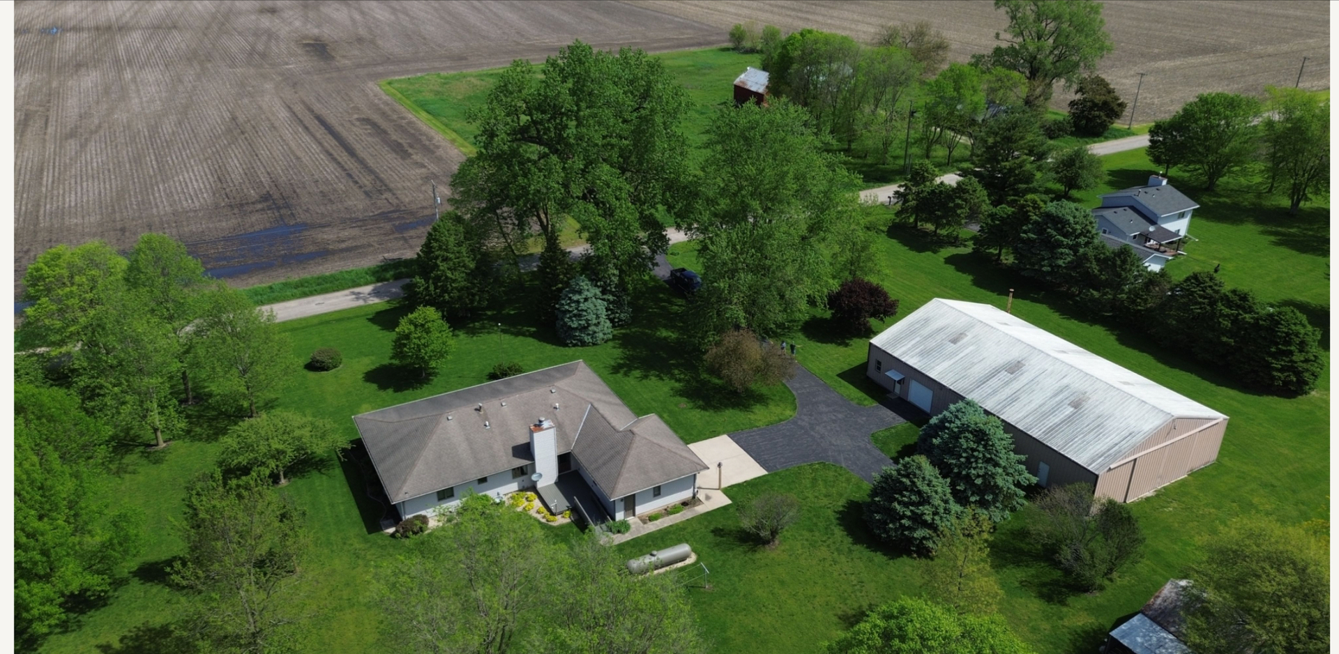 1685 West Mine Road Mazon, IL 60444 - Photo 8 of 48 an aerial view of a house with pool yard and outdoor seating