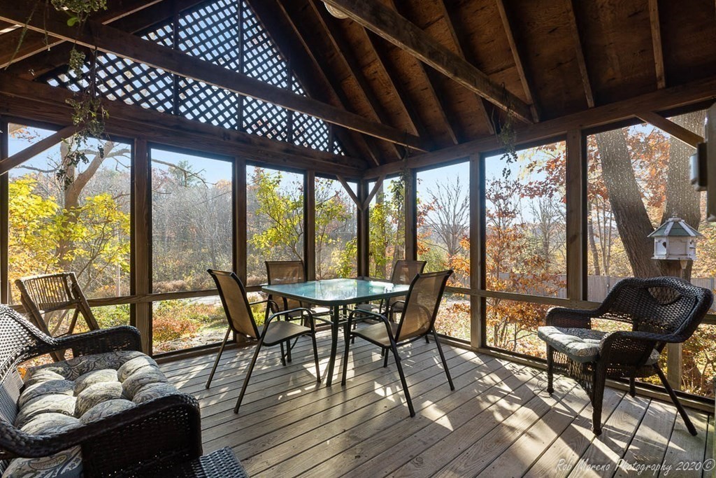 38 Boston Road Newbury, MA 01951 - Photo 35 of 42 a dining room with furniture water view and wooden floor