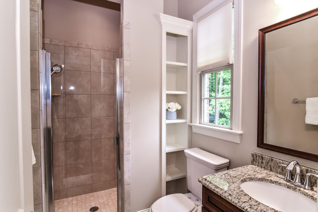 6924 Mactavish Way Raleigh, NC 27613 - Photo 11 of 30 Full bathroom attached to guest bedroom on main floor. Main Level Bath
