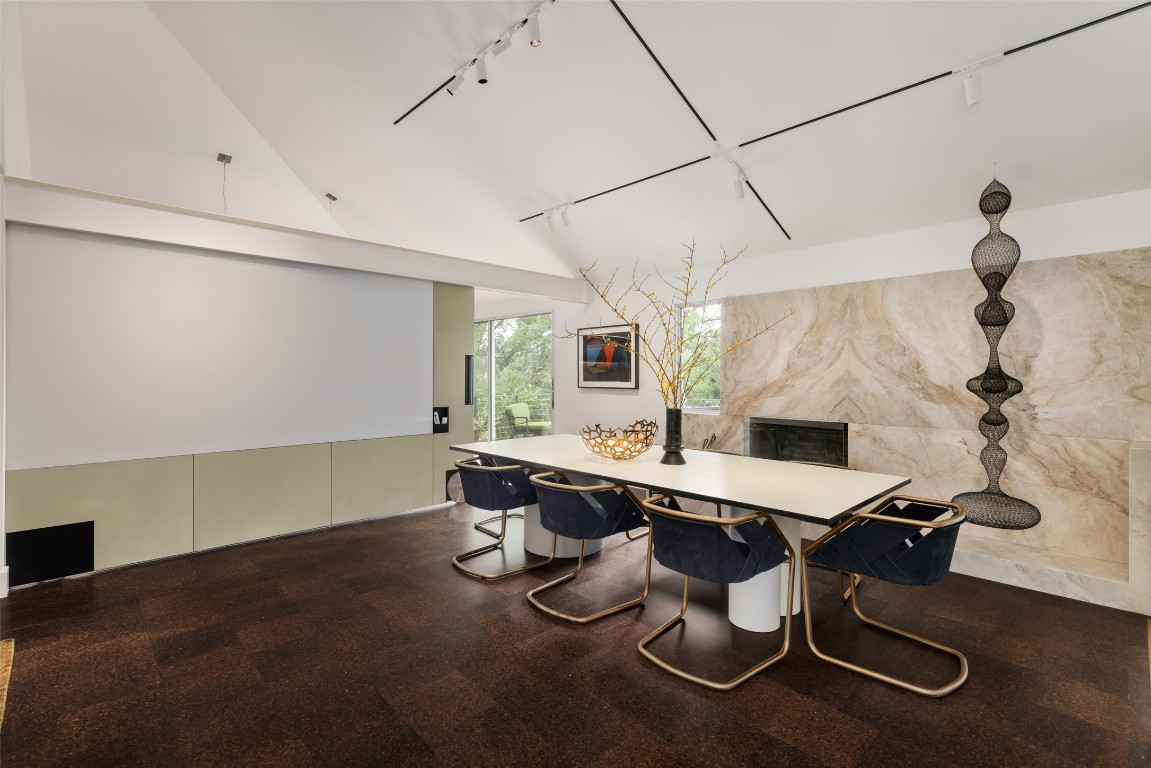 2908 Scenic Drive Austin, TX 78703 - Photo 12 of 40 a kitchen with a table chairs and a wooden floor
