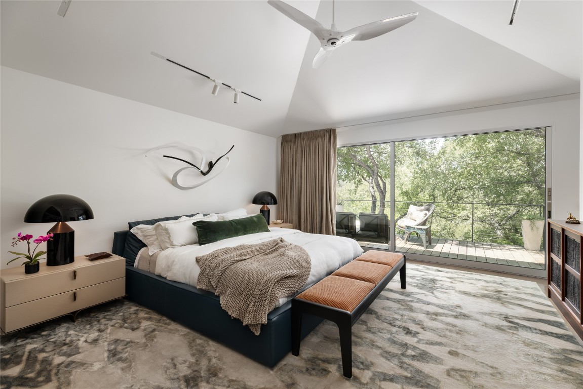 2908 Scenic Drive Austin, TX 78703 - Photo 22 of 40 a bedroom with a bed and a large window
