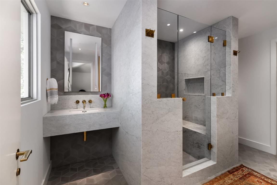 2908 Scenic Drive Austin, TX 78703 - Photo 24 of 40 a bathroom with a sink and a mirror