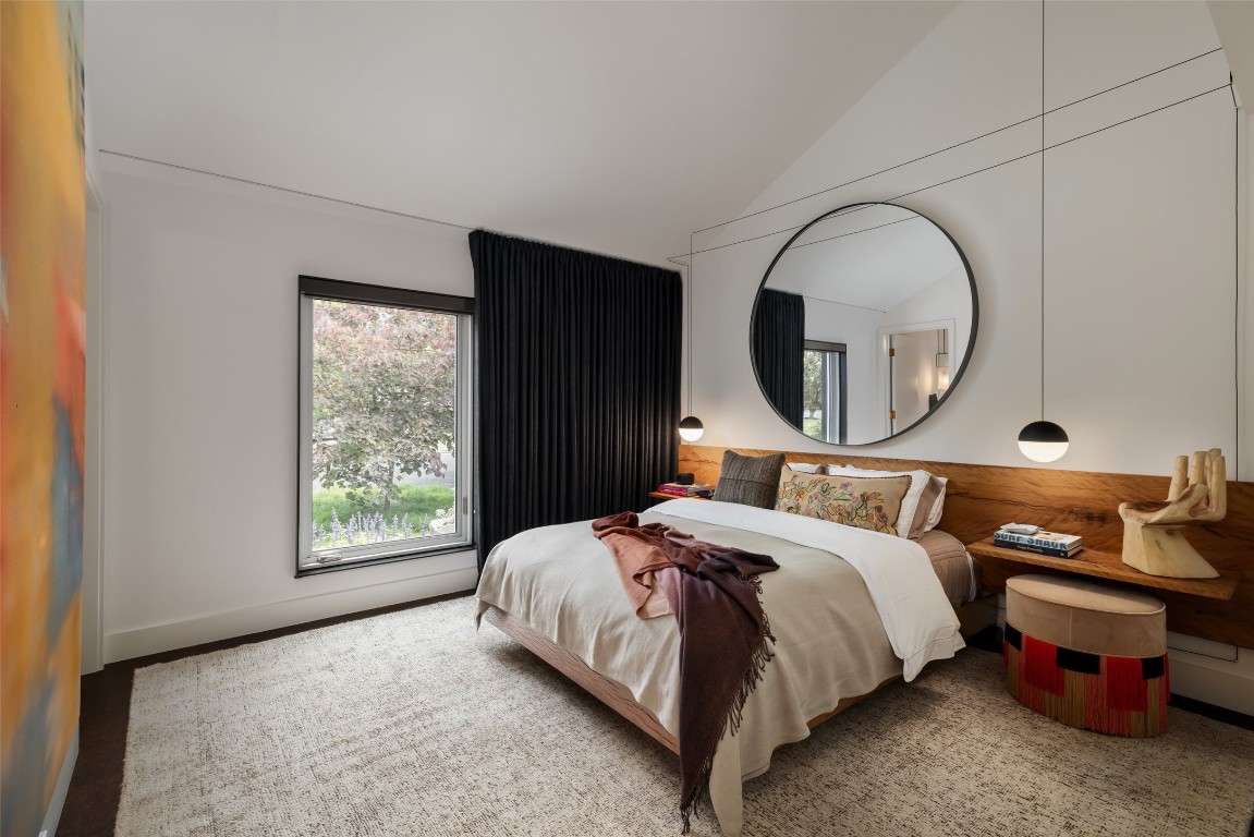 2908 Scenic Drive Austin, TX 78703 - Photo 26 of 40 a bed room with a bed and a mirror