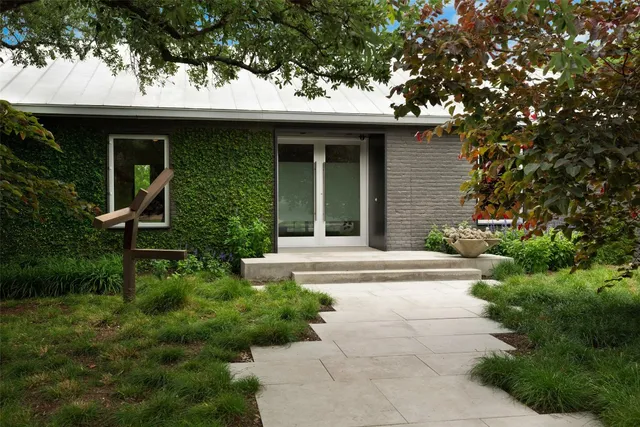 a view of a living room and kitchen
