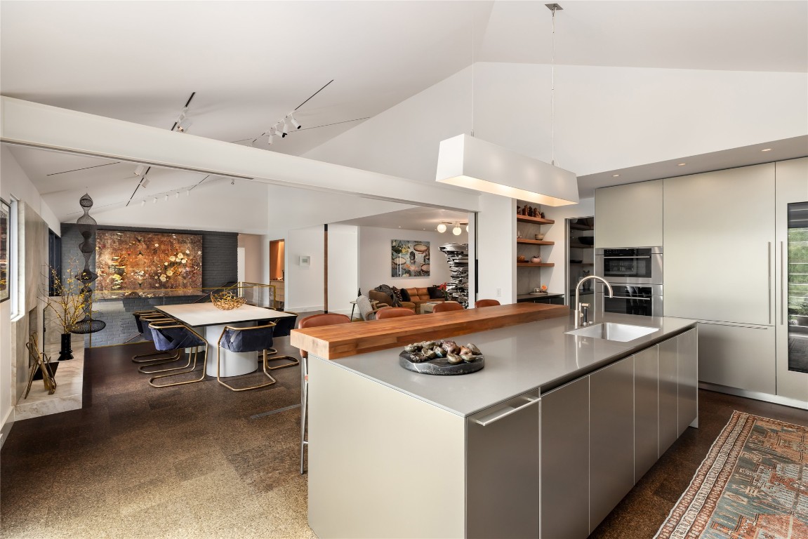 2908 Scenic Drive Austin, TX 78703 - Photo 9 of 40 a kitchen with a stove and a refrigerator