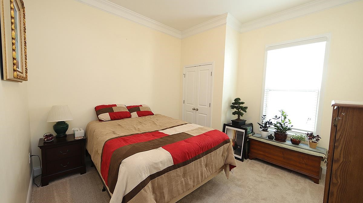 7524 Oakberry Drive Raleigh, NC 27616 - Photo 14 of 22 Another nice sized bedroom right off the hall next to full bath-great for guests! Bedroom