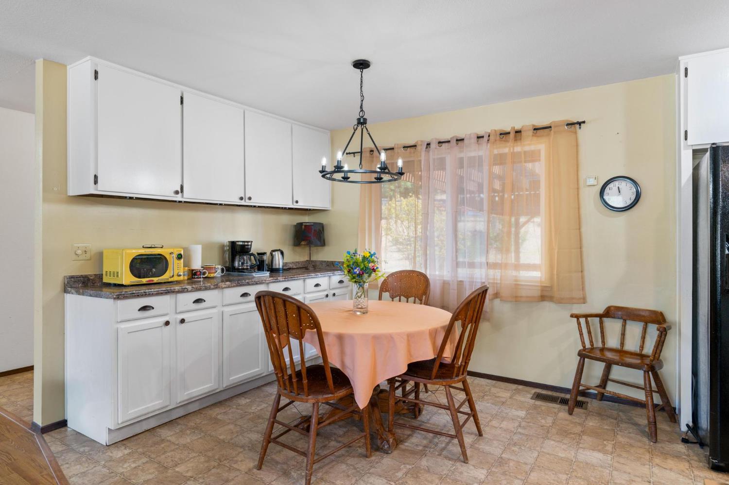 18490 Railbed Road Jamestown, CA 95327 - Photo 23 of 53 a view of a dining room with furniture window and outside view