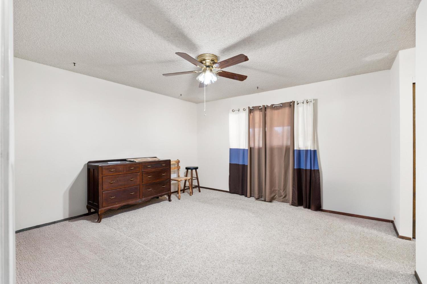 18490 Railbed Road Jamestown, CA 95327 - Photo 25 of 53 a view of workspace with furniture and ceiling fan