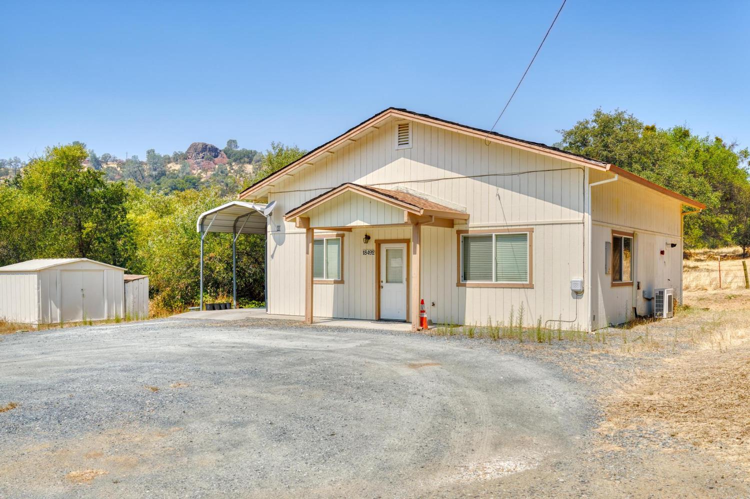 18490 Railbed Road Jamestown, CA 95327 - Photo 41 of 53 a front view of a house with a yard