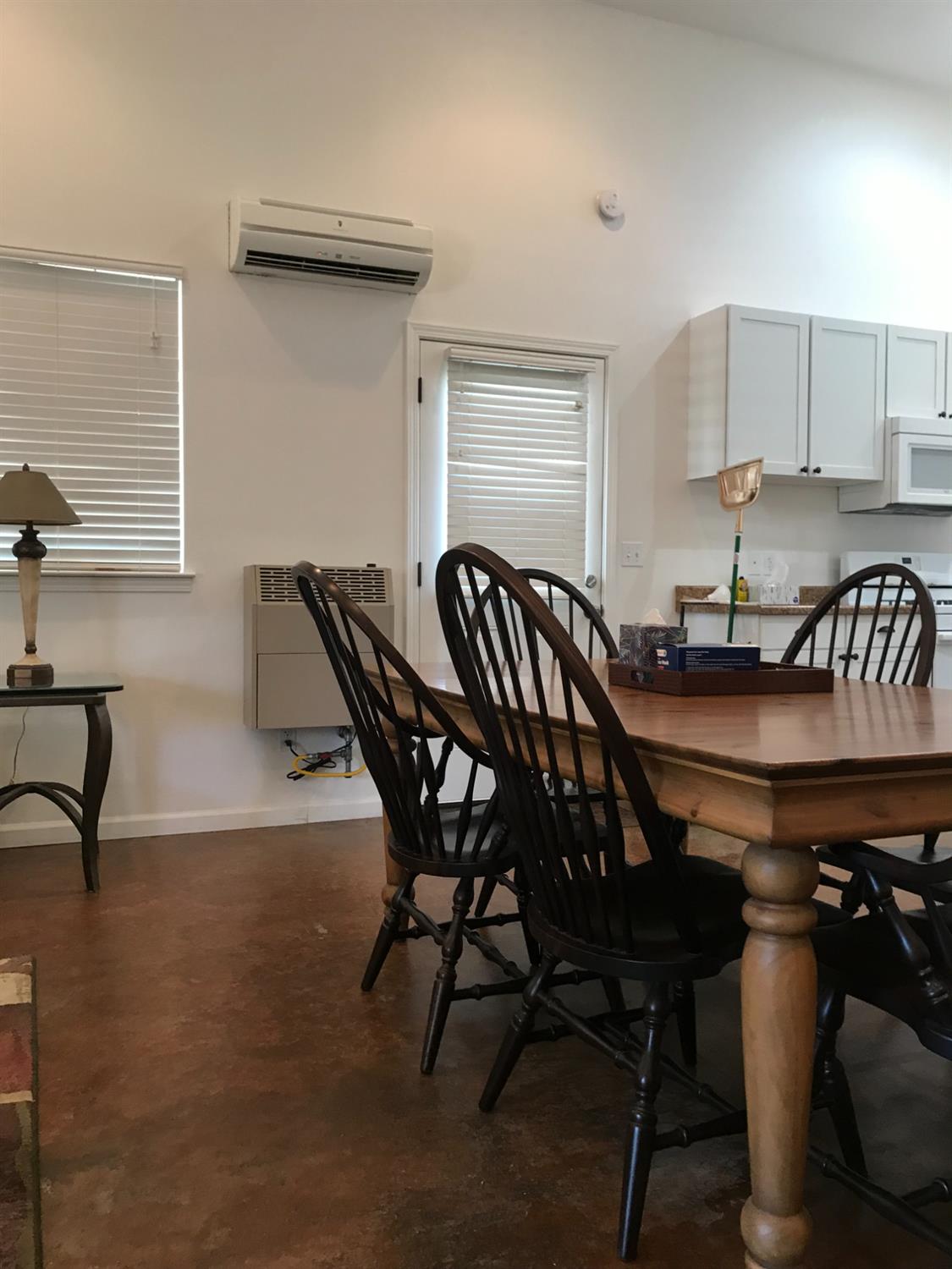 18490 Railbed Road Jamestown, CA 95327 - Photo 49 of 53 a view of a dining room with furniture and a window
