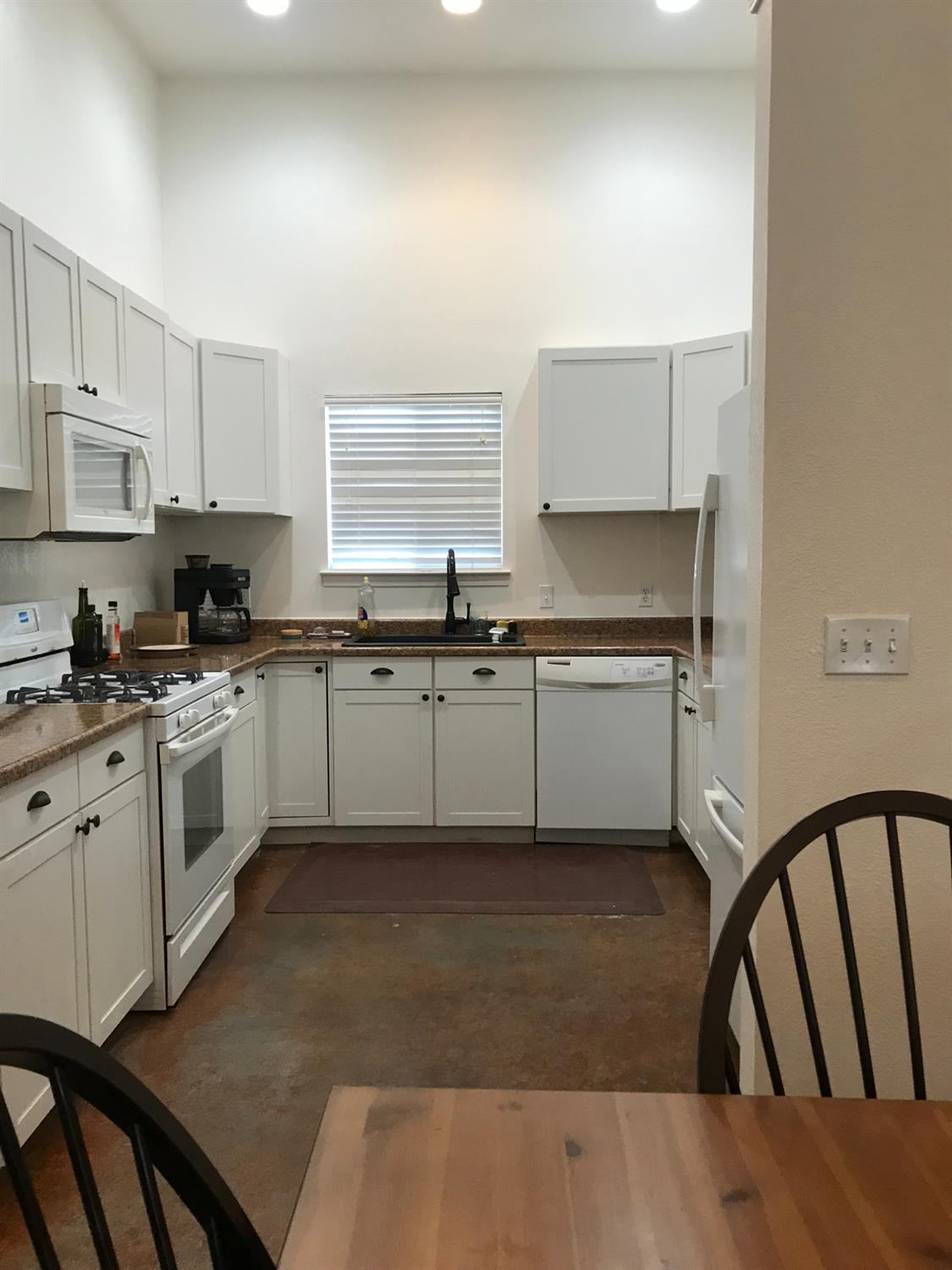 18490 Railbed Road Jamestown, CA 95327 - Photo 50 of 53 a kitchen with a sink cabinets and window