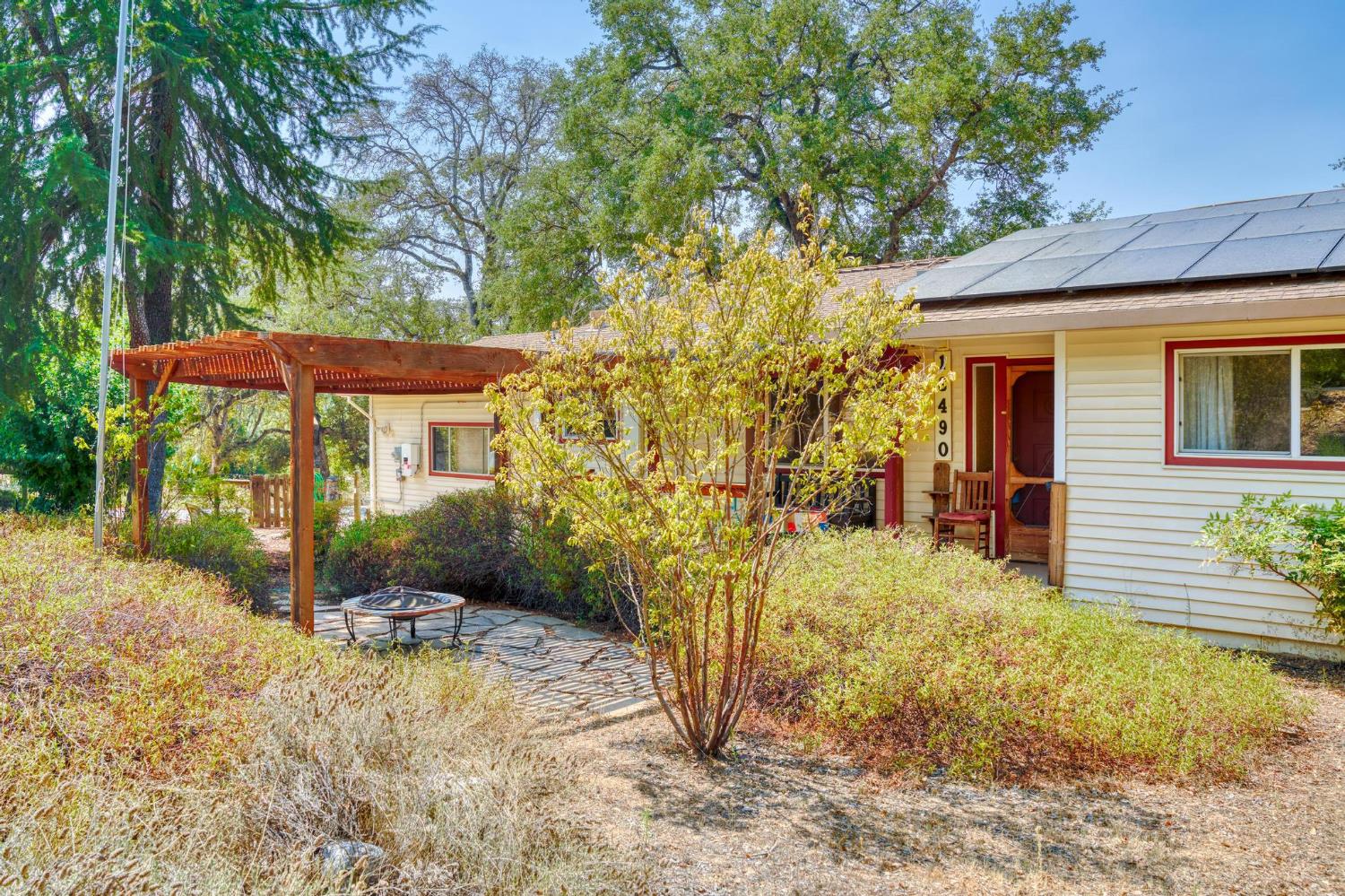 18490 Railbed Road Jamestown, CA 95327 - Photo 10 of 53 a view of a house with a yard