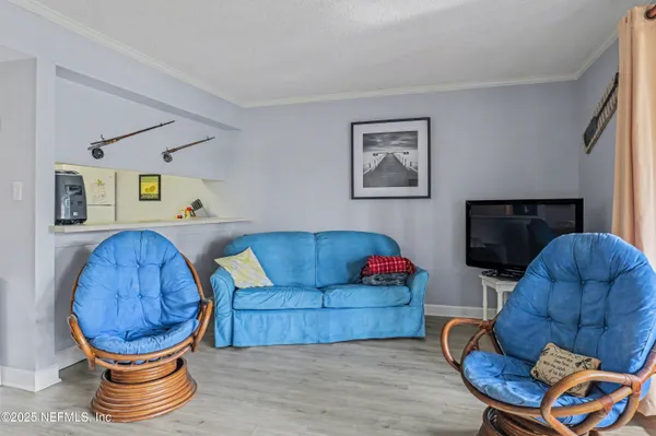 a bed room with furniture and a window