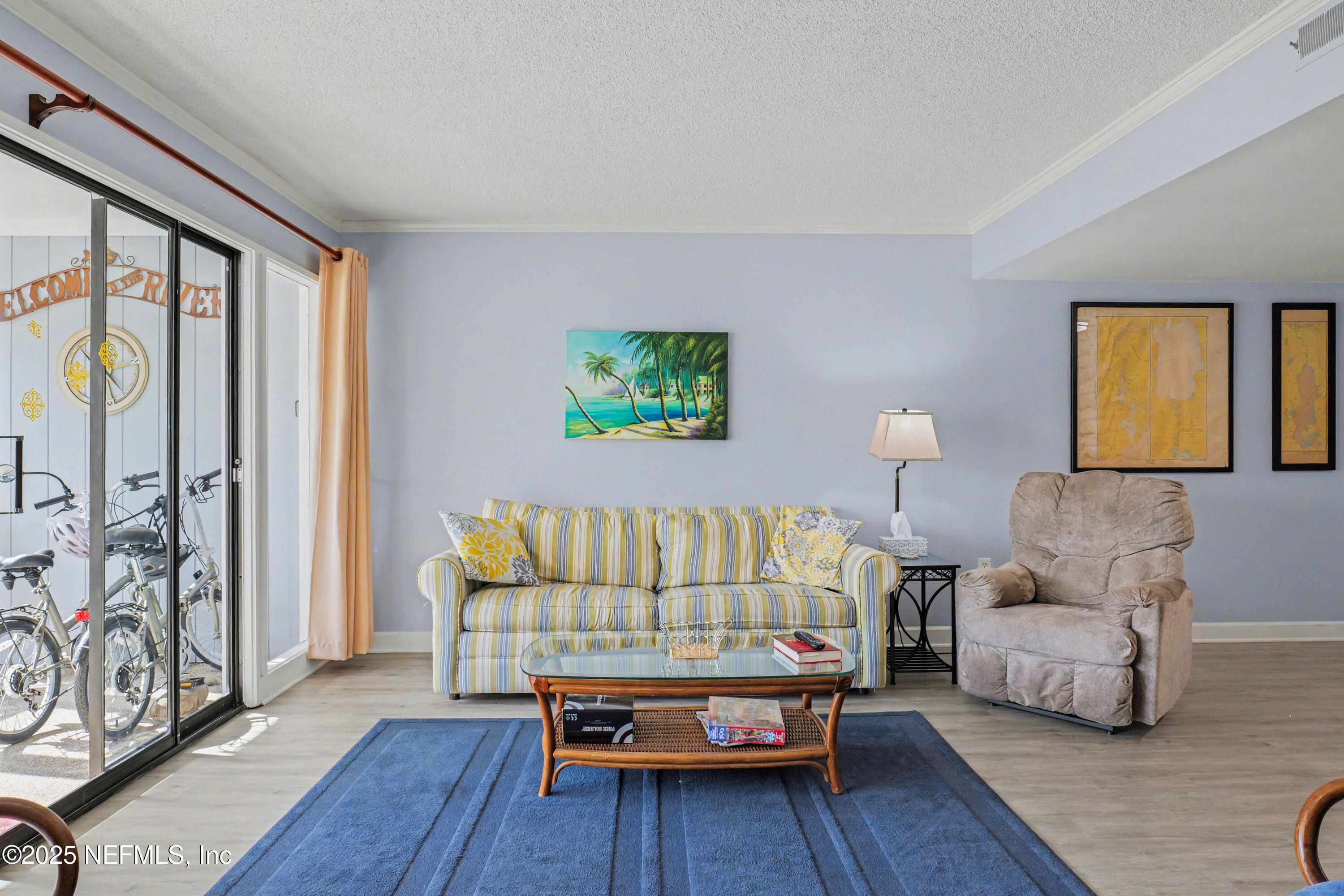 102 River Bend Road, Unit A Welaka, FL 32193 - Photo 27 of 39 a bed room with furniture and a window