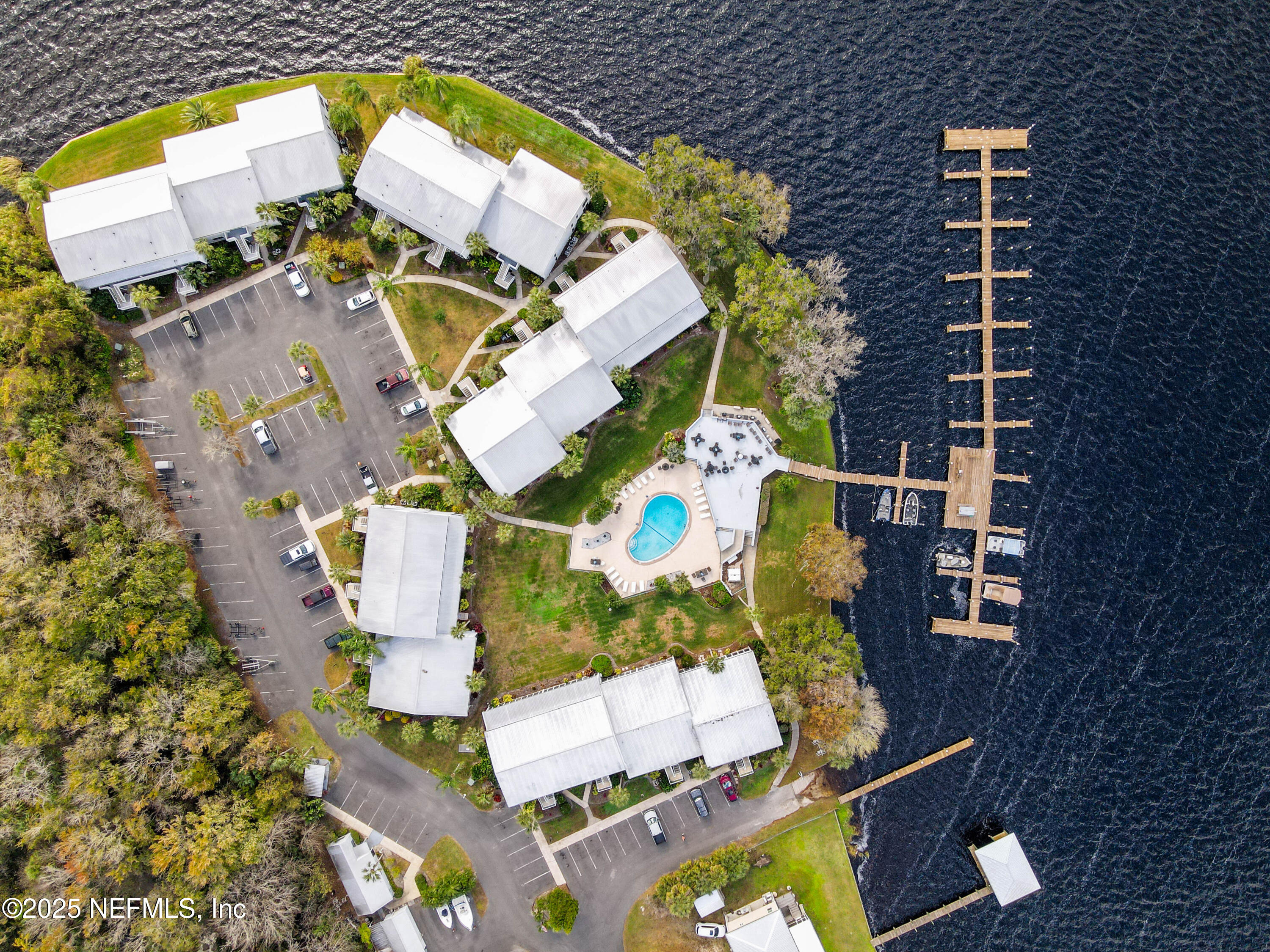 102 River Bend Road, Unit A Welaka, FL 32193 - Photo 3 of 39 an aerial view of house with a yard