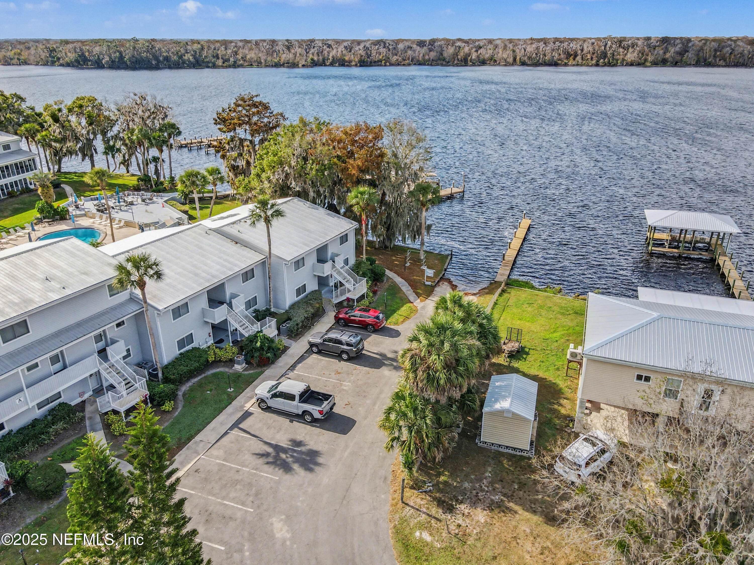 102 River Bend Road, Unit A Welaka, FL 32193 - Photo 9 of 39 an aerial view of a house with outdoor seating