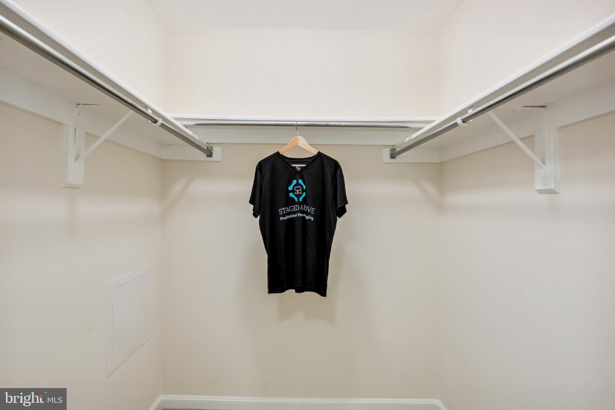 212 Ridgepoint Place, Unit 21218 Gaithersburg, MD 20878 - Photo 23 of 51 Primary suite walk-in closet