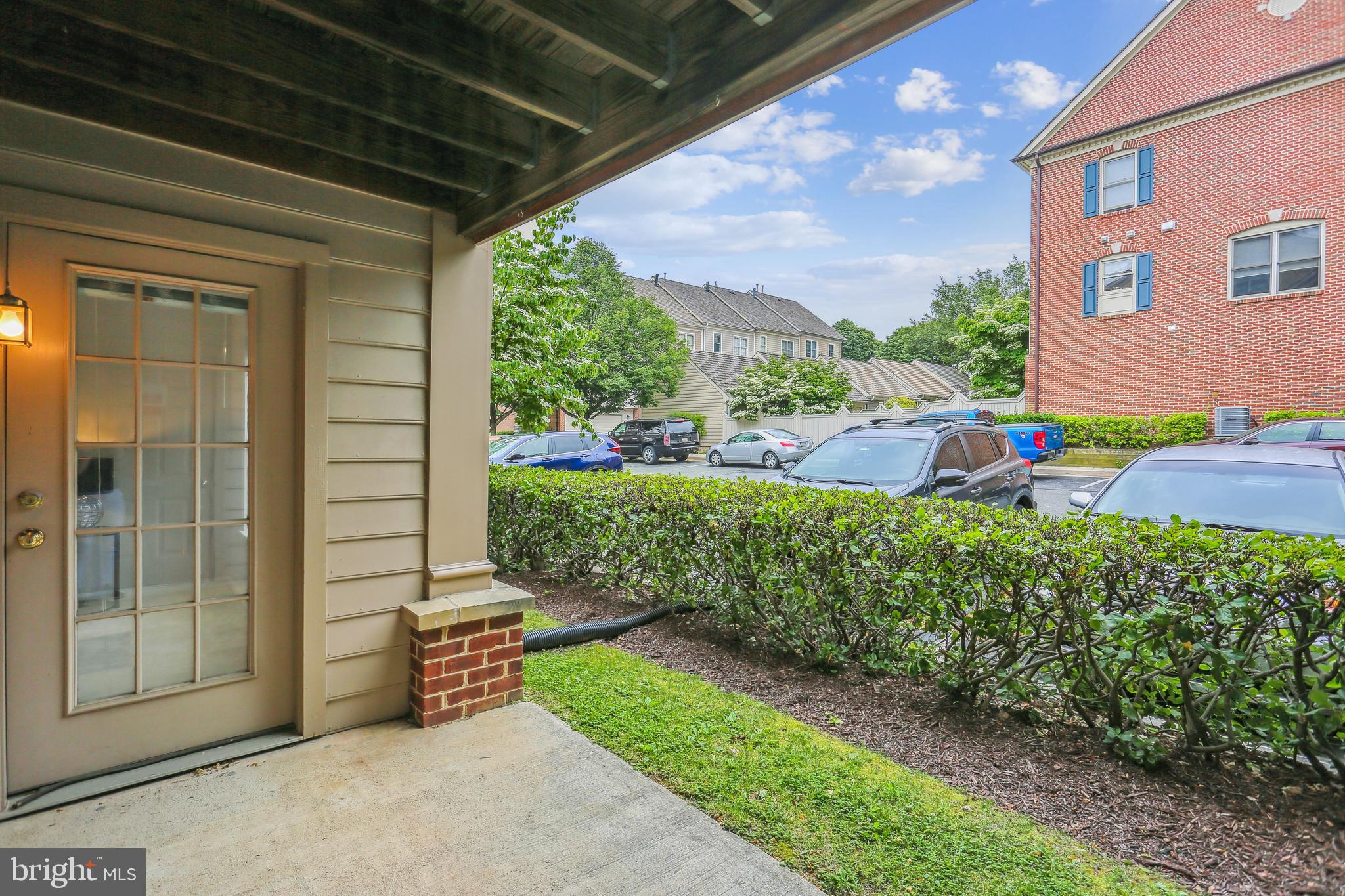 212 Ridgepoint Place, Unit 21218 Gaithersburg, MD 20878 - Photo 28 of 51 Patio offers sunset views