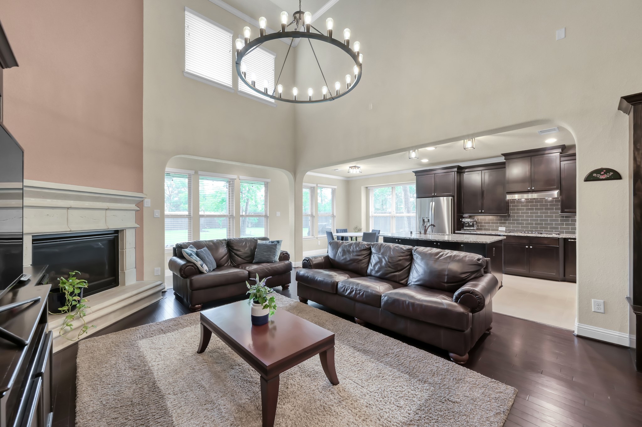 23 Rancher's Trail Tomball, TX 77375 - Photo 7 of 40 This spacious living area with it's ample natural light, effortlessly accommodates oversized furniture, offering the perfect blend of style and functionality.